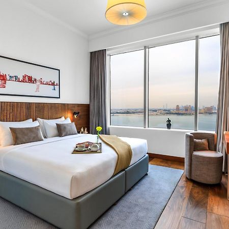 Somerset West Bay Doha Exterior photo A bedroom at the hotel