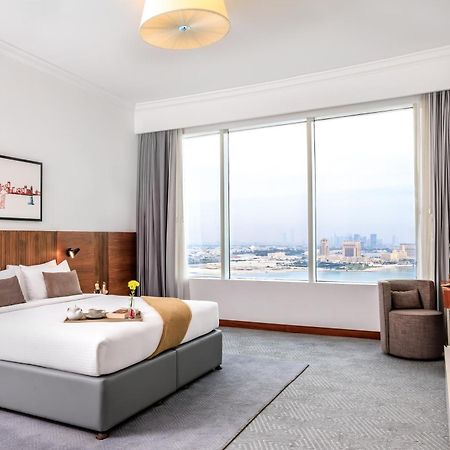 Somerset West Bay Doha Exterior photo A bedroom at the hotel