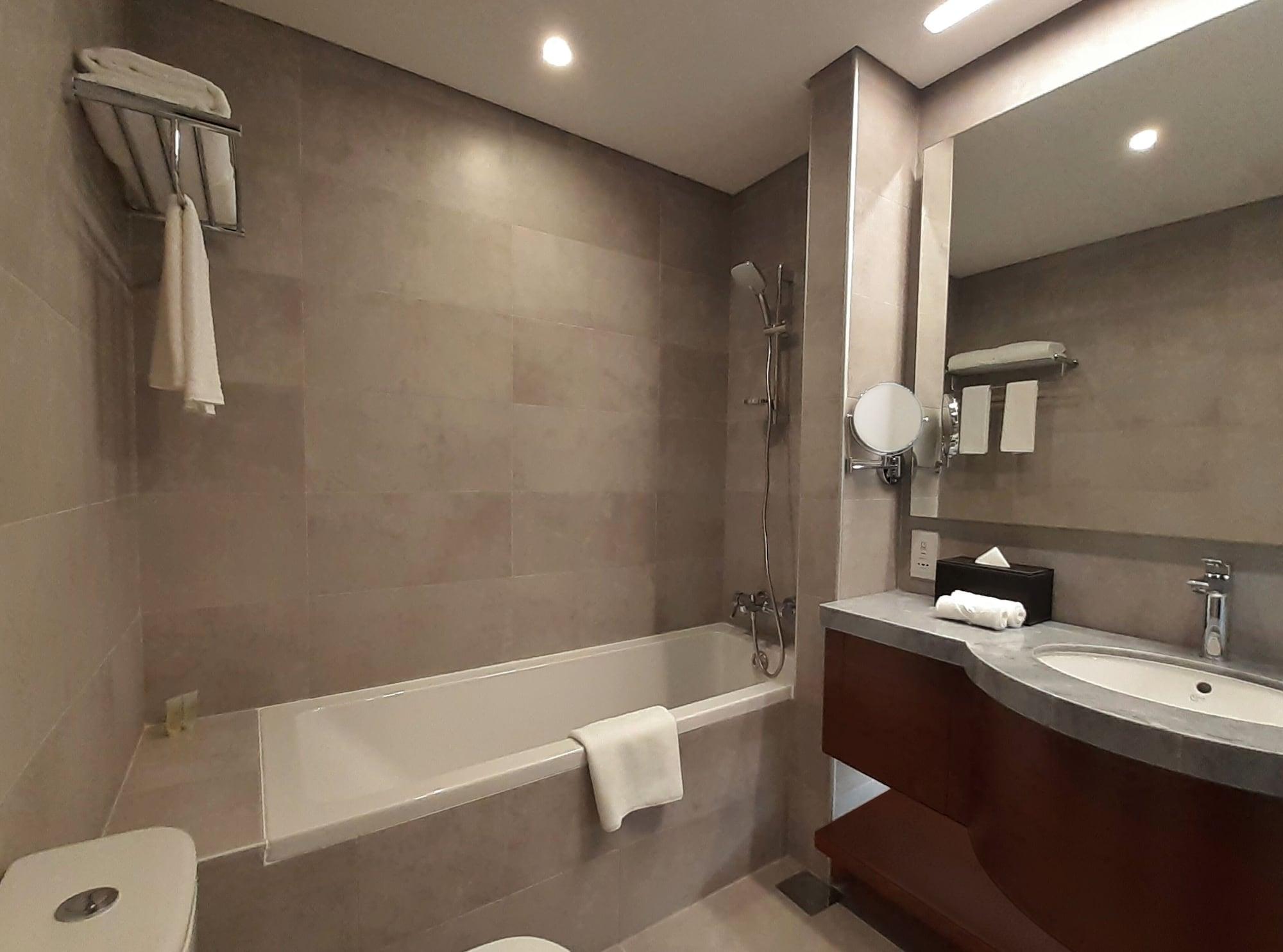Somerset West Bay Doha Exterior photo Bathroom of a hotel room