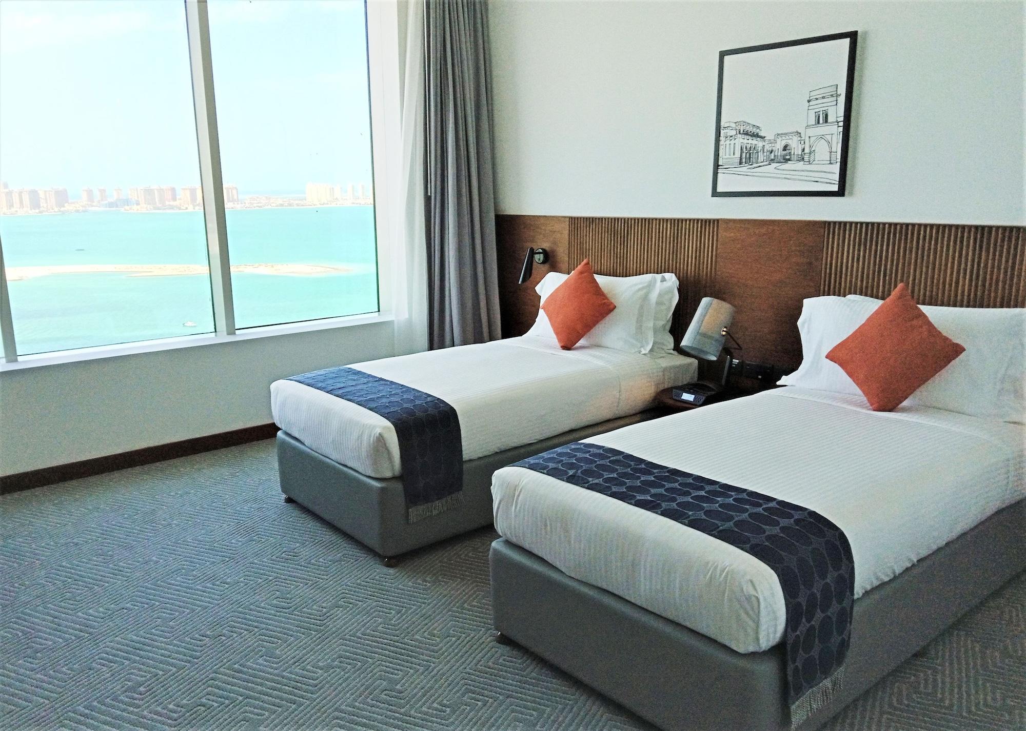 Somerset West Bay Doha Exterior photo Deluxe Room