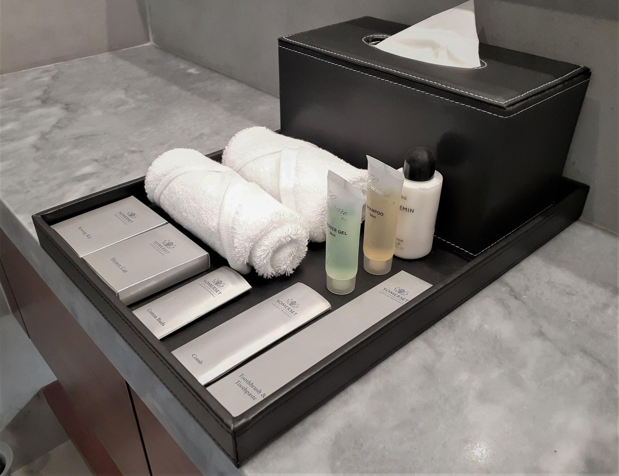 Somerset West Bay Doha Exterior photo A bathroom amenity tray
