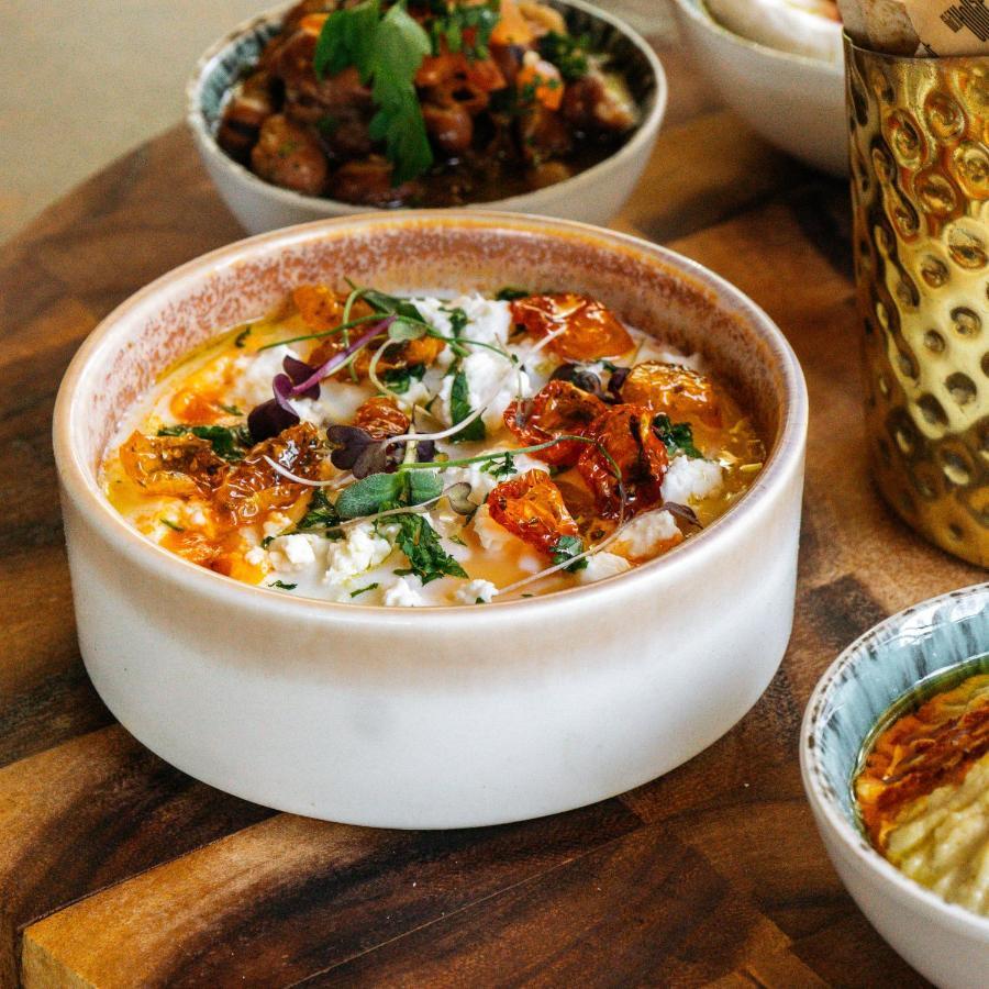 Somerset West Bay Doha Exterior photo Labneh with olive oil, sumac, and olives
