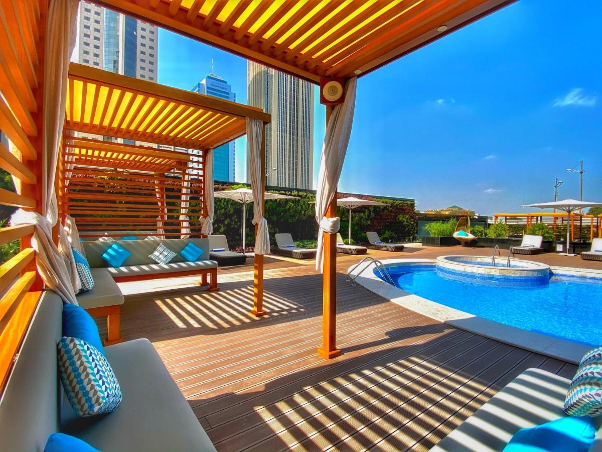 Somerset West Bay Doha Exterior photo The swimming pool at the hotel