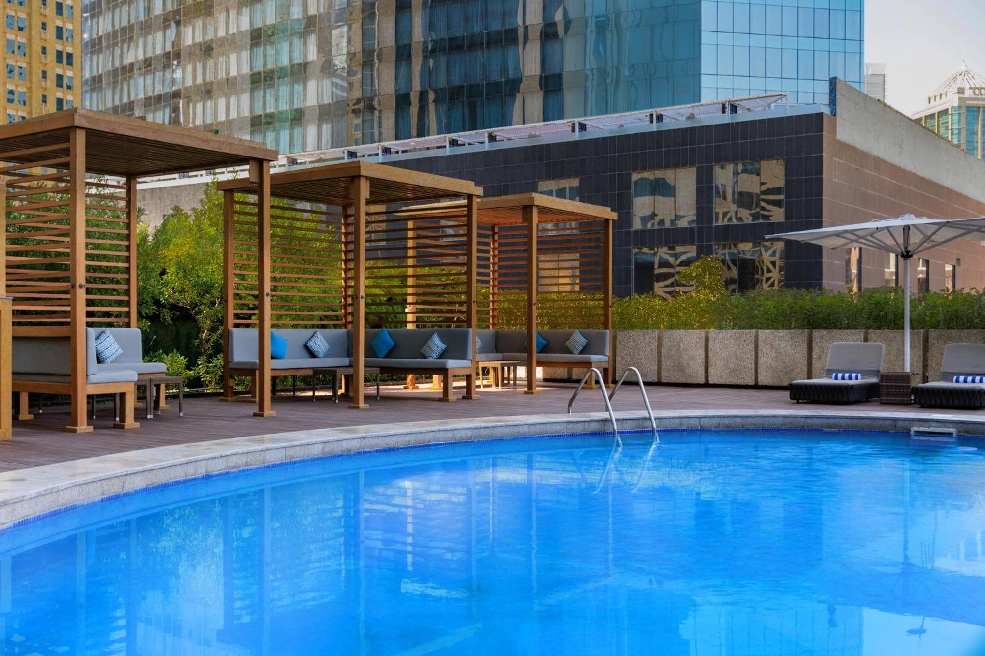 Somerset West Bay Doha Exterior photo The swimming pool at the hotel