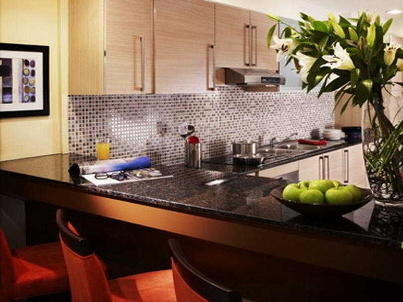 Somerset West Bay Doha Room photo A kitchen at The Standard East Village